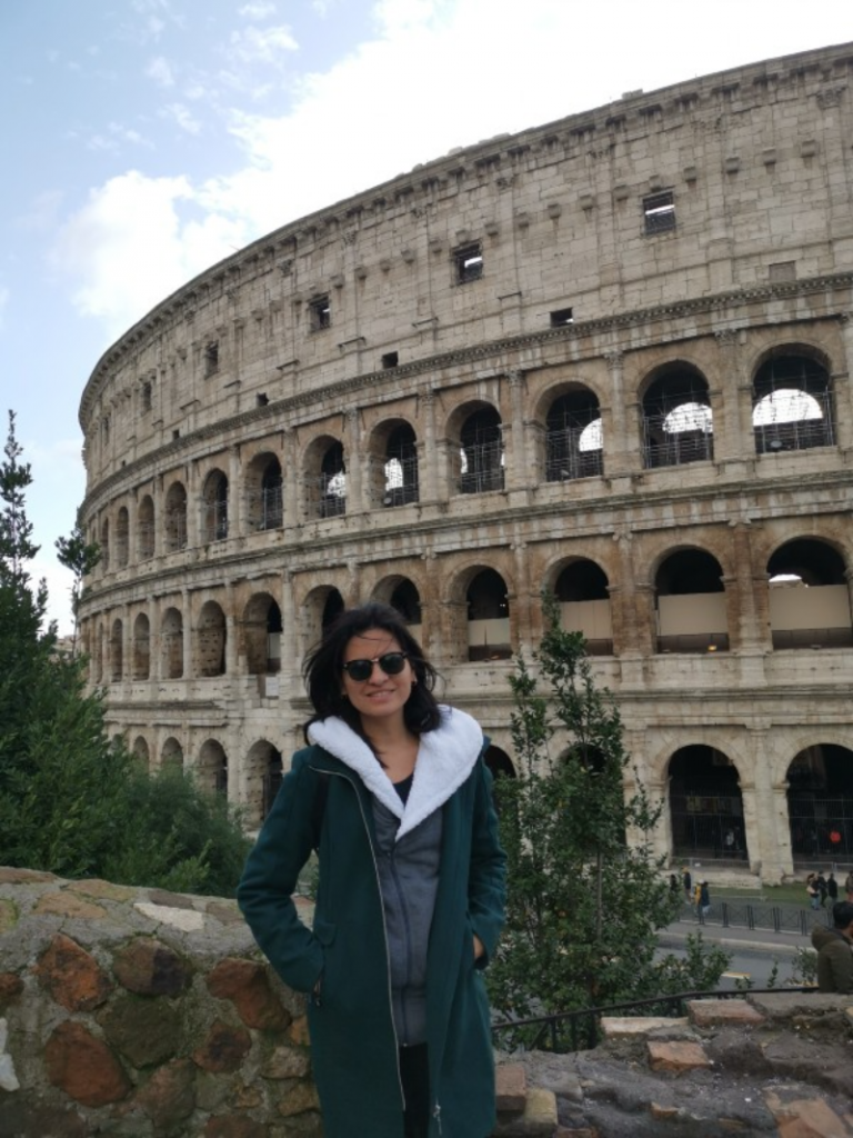 comunicacion - con El Coliseo De Fondo