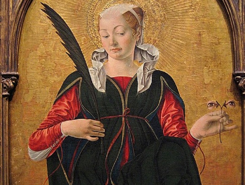 Raffigurazione Di Santa Lucia con una piuma in mano