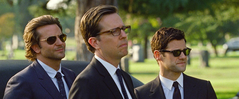 A scene from the movie The Hangover, where Bradley Cooper is joined by actors Ed Helms and Justin Bartha