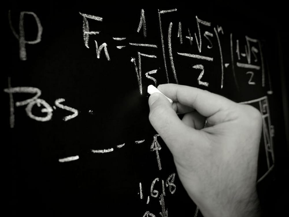 Thomas Passera - formulas on the blackboard