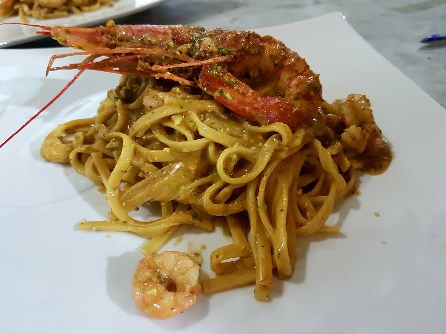 pasta - linguine with lobster resting on top