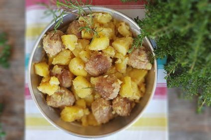 pan with meatballs baked with tasty potatoes