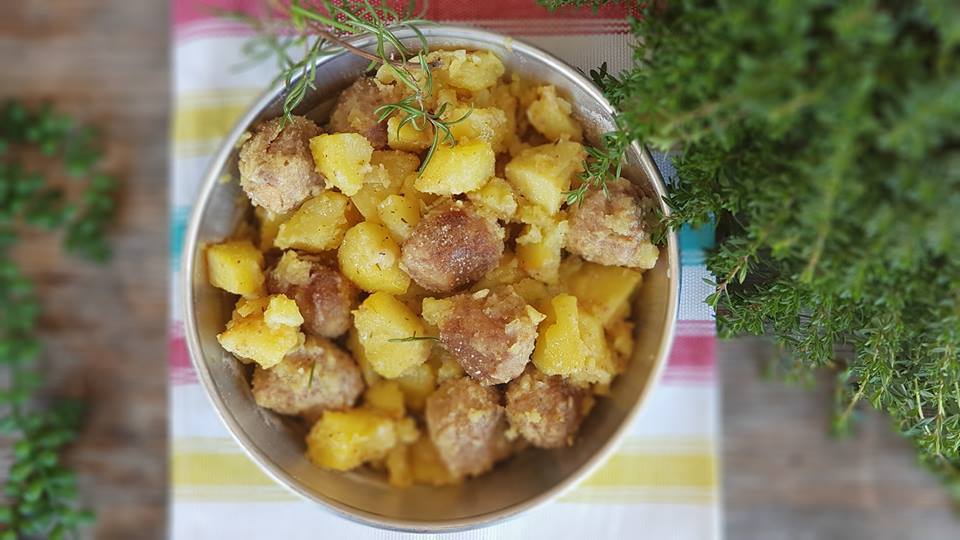 pan with meatballs baked with tasty potatoes