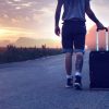 out-of-doors - A boy leaving with a suitcase