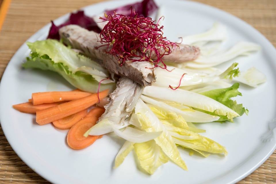 mackerel marinated in a plate with vegetables