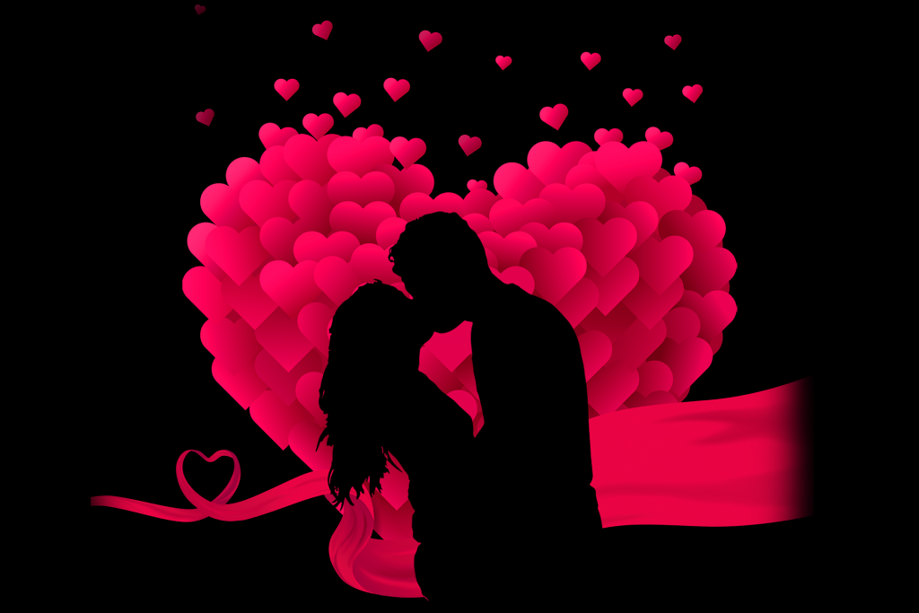 amore fra uomo e donna - immagine di un cuore di palloncini con dentro un uomo ed una donna che si baciano