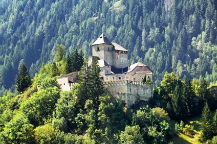Sterzing. Ithe Castle of Tasso among the hilly vegetation