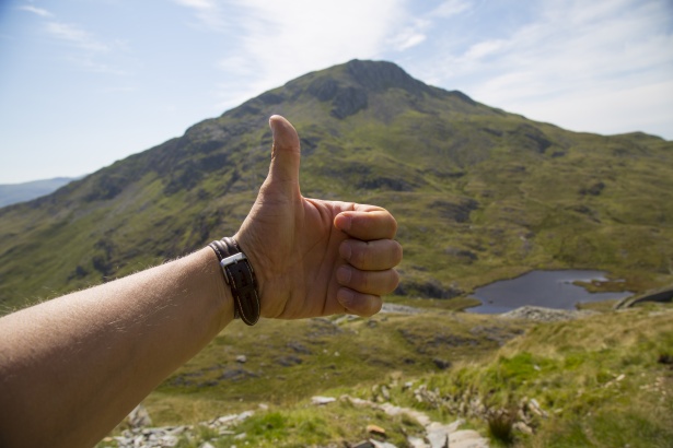 optimism - hand with thumb up