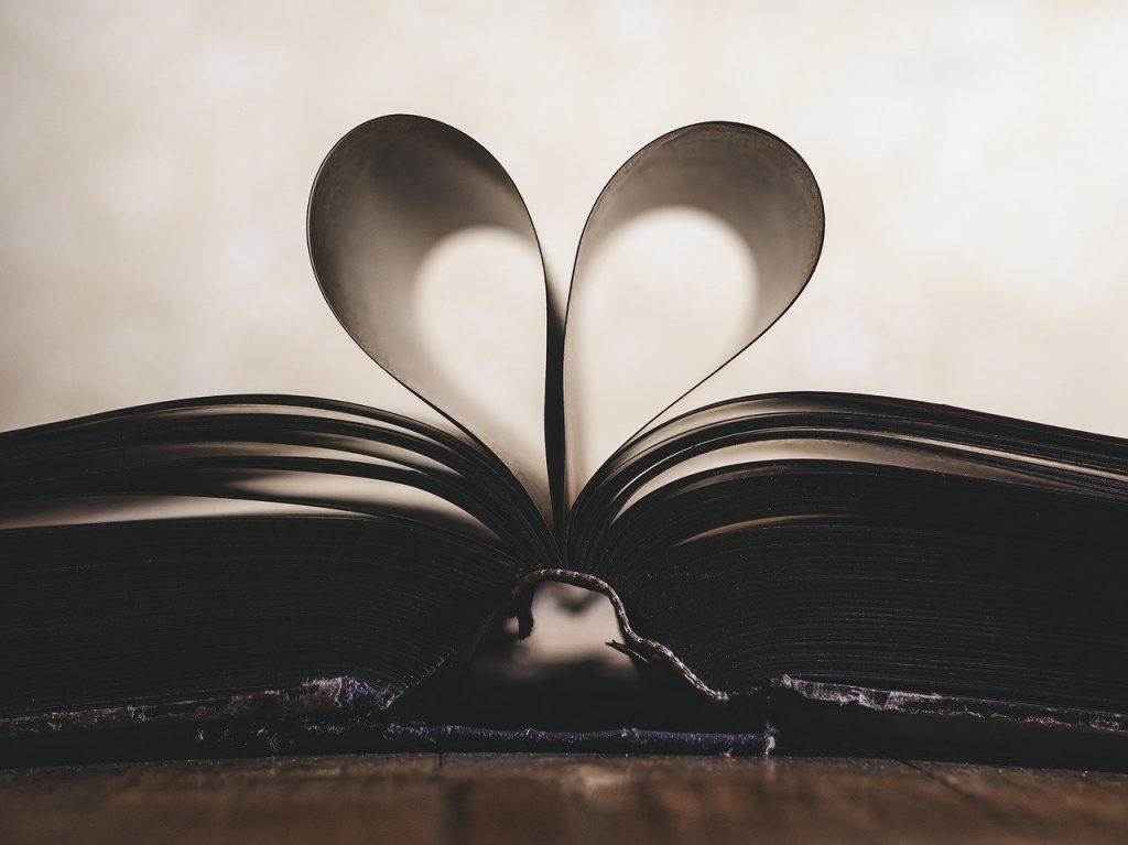 film - two book pages forming a heart