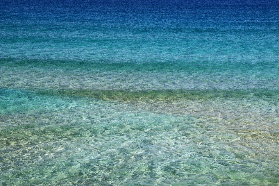 blue flags - a crystal clear sea