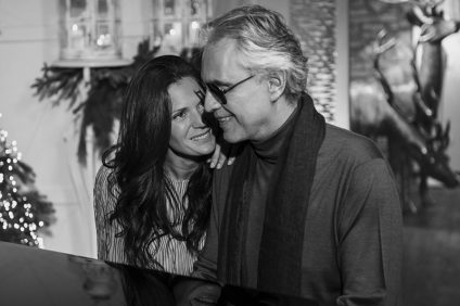 black and white photo of Bocelli with his wife