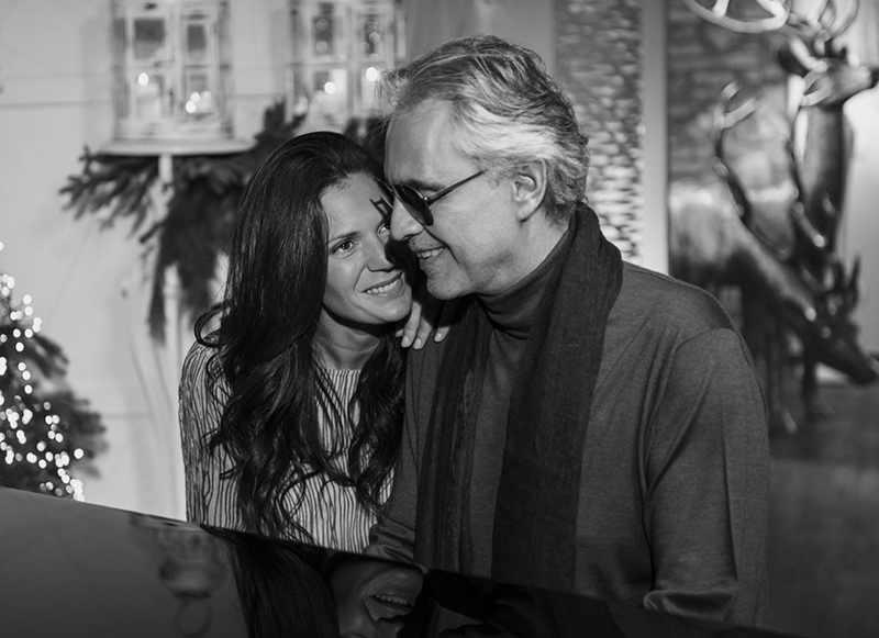 black and white photo of Bocelli with his wife