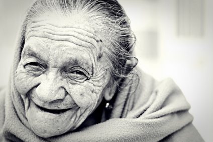 centenaries - black and white photo of an old woman