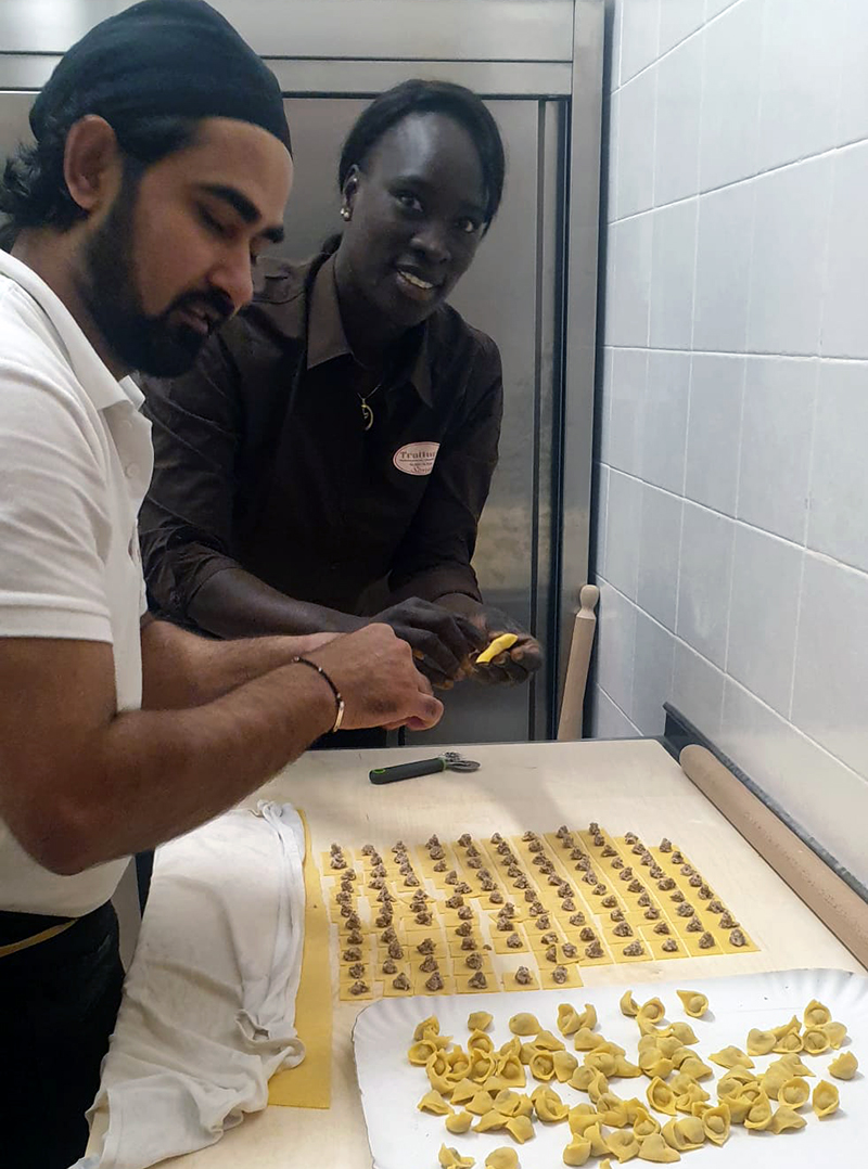 Integration - two cooks prepare the ravioli