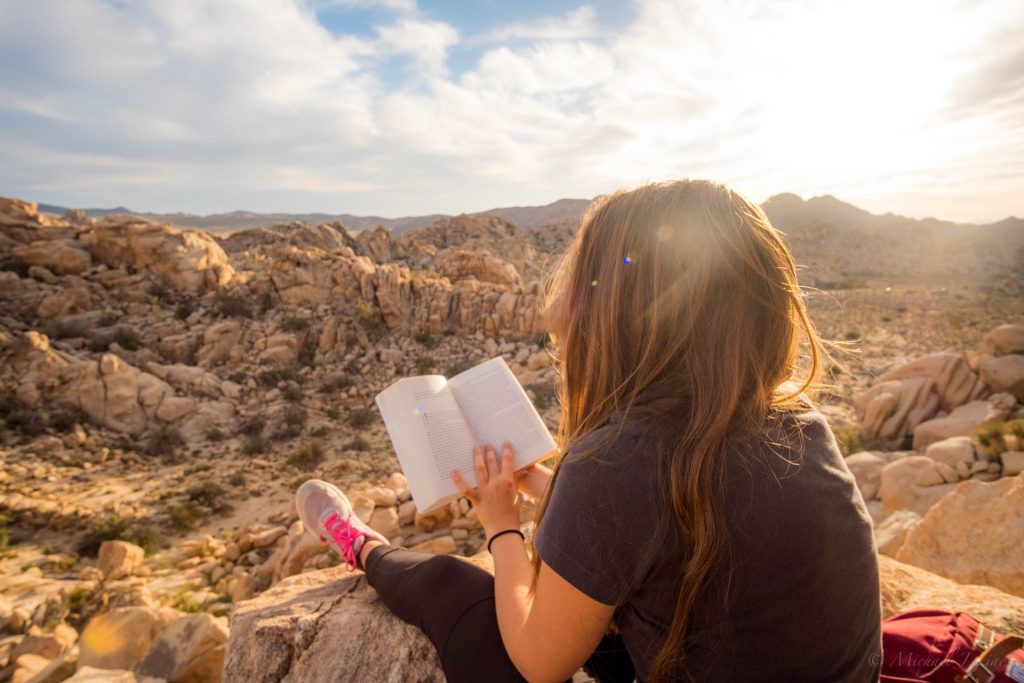 woman reading aphorisms