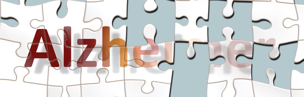 puzzle con la scritta Alzheimer