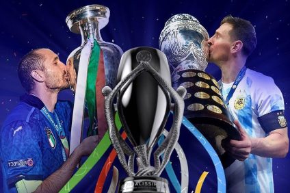Final 2022 - Chiellini and Messi kiss the trophies of Euro 2022 and Copa América