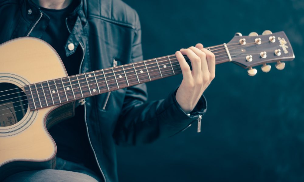 Música - Tocando La Guitarra